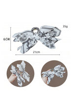 Load image into Gallery viewer, Black Paisley Floral Print Bow Knot Hair Clip
